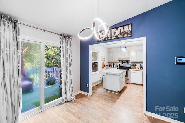 2116 Bon Villa Way, Fort Mill, SC 29708 - kitchen featuring stainless steel range with electric stovetop, white dishwasher, white cabinetry, light wood finished floors, and a chandelier