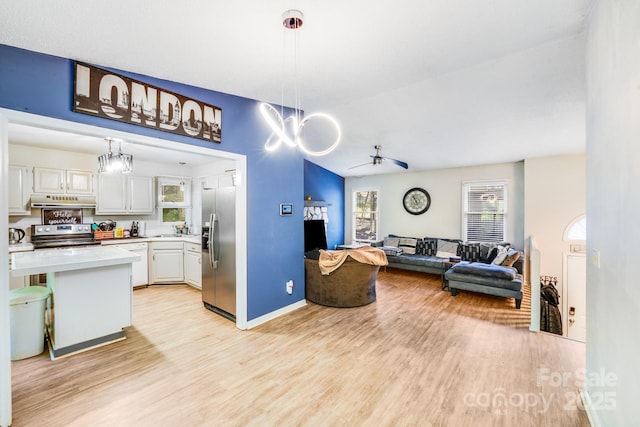 2116 Bon Villa Way, Fort Mill, SC 29708 - living room featuring light wood-style floors, a ceiling fan, and plenty of natural light