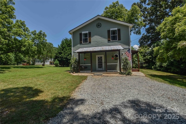 1239 Mac Ln, Stanley, NC 28164 - traditional-style house with a porch, a front lawn, and driveway
