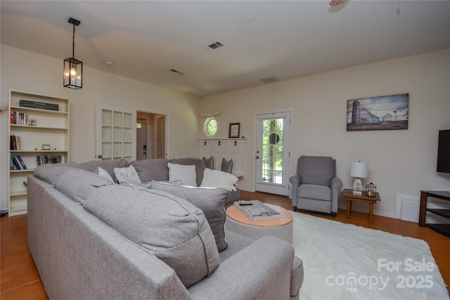 1239 Mac Ln, Stanley, NC 28164 - living area featuring wood finished floors