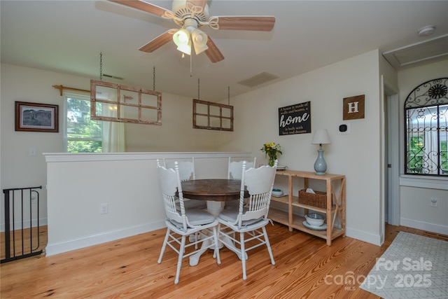 1239 Mac Ln, Stanley, NC 28164 - dining area with wood finished floors and a ceiling fan