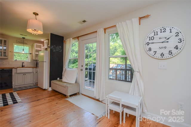 1239 Mac Ln, Stanley, NC 28164 - entryway with healthy amount of natural light and light wood-style floors