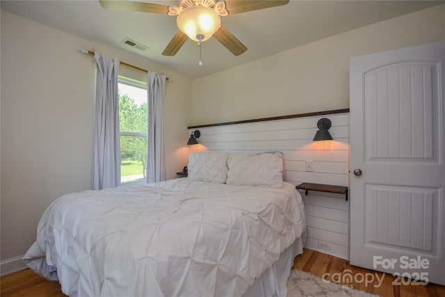 1239 Mac Ln, Stanley, NC 28164 - bedroom featuring wood finished floors and ceiling fan