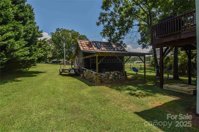1239 Mac Ln, Stanley, NC 28164 - view of green lawn with a deck