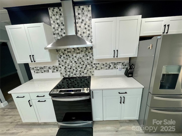 6490 Alta Ctr, Denver, NC 28037 - kitchen featuring stainless steel appliances, wall chimney exhaust hood, light wood-style floors, and tasteful backsplash