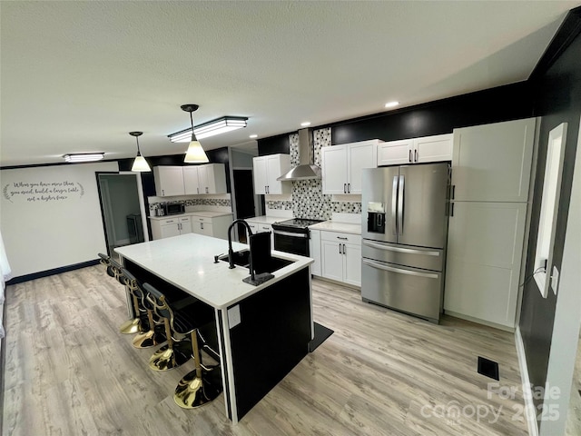 6490 Alta Ctr, Denver, NC 28037 - kitchen with stainless steel fridge, wall chimney exhaust hood, range with electric cooktop, backsplash, and white cabinetry