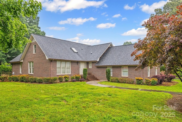 36433 Azalea Cir, New London, NC 28127 - view of front of home featuring brick siding, a shingled roof, and a front lawn