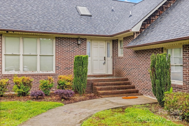 36433 Azalea Cir, New London, NC 28127 - property entrance with roof with shingles and brick siding