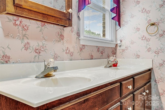 36433 Azalea Cir, New London, NC 28127 - bathroom featuring wallpapered walls and double vanity