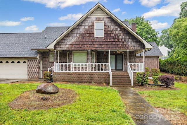 36433 Azalea Cir, New London, NC 28127 - view of front of home featuring covered porch, brick siding, a chimney, an attached garage, and a front lawn