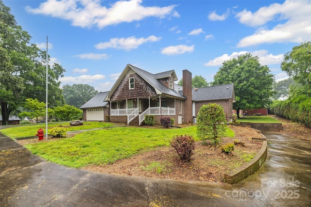 36433 Azalea Cir, New London, NC 28127 - view of front facade with a porch, a chimney, a front lawn, and roof with shingles