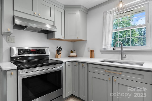 2623 NE 13th St NE, Hickory, NC 28601 - kitchen featuring stainless steel electric range, ventilation hood, gray cabinetry, and hanging light fixtures