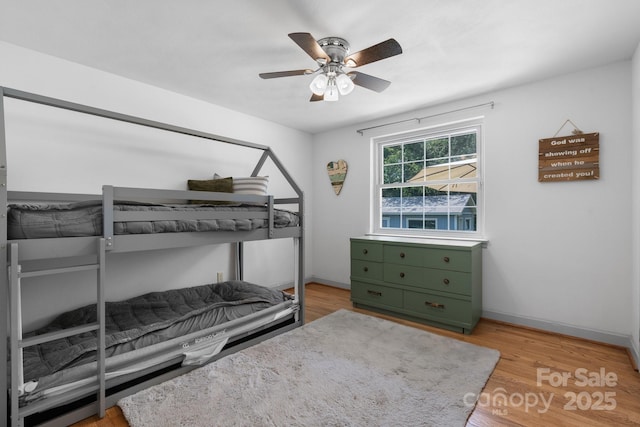 2623 NE 13th St NE, Hickory, NC 28601 - bedroom with light wood-style floors and ceiling fan