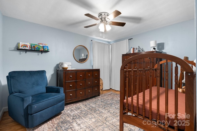 2623 NE 13th St NE, Hickory, NC 28601 - bedroom with wood finished floors and a ceiling fan
