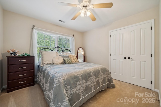 4716 Heatherton Pl, Charlotte, NC 28270 - bedroom with carpet floors, a closet, and a ceiling fan
