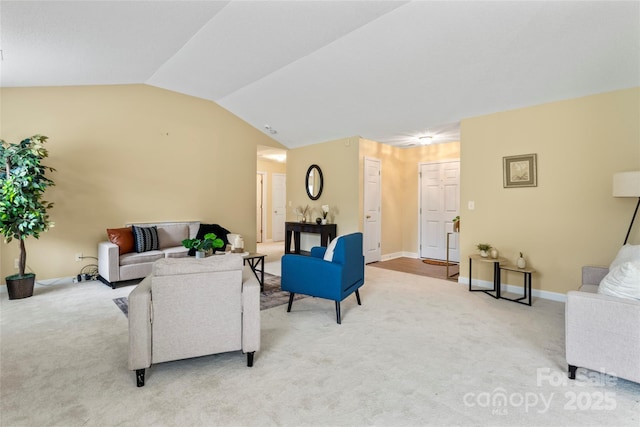 7616 Shiny Meadow Ln, Charlotte, NC 28215 - living room with light colored carpet and vaulted ceiling