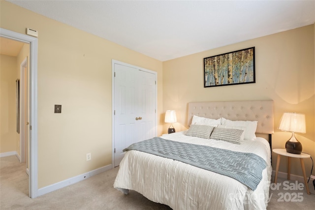 7616 Shiny Meadow Ln, Charlotte, NC 28215 - bedroom with light colored carpet and a closet