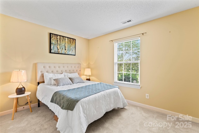 7616 Shiny Meadow Ln, Charlotte, NC 28215 - carpeted bedroom with baseboards and a textured ceiling