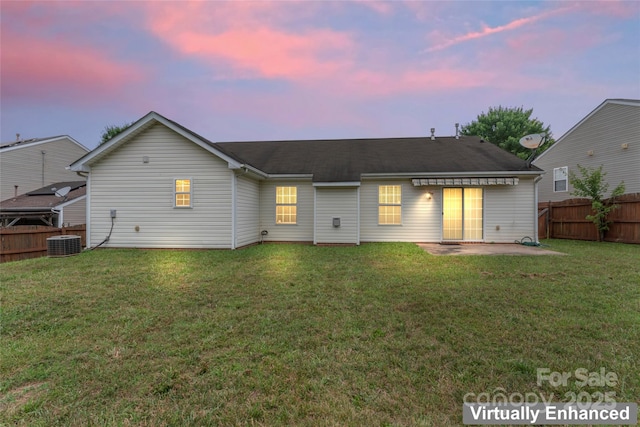 7616 Shiny Meadow Ln, Charlotte, NC 28215 - back of house at dusk featuring a patio area