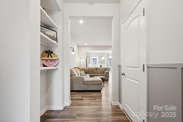 13323 Savaine St, Charlotte, NC 28278 - hallway with dark wood-style floors and recessed lighting