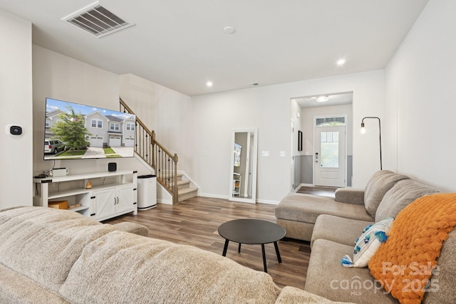 13323 Savaine St, Charlotte, NC 28278 - living room featuring wood finished floors, stairs, and recessed lighting