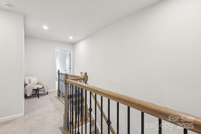 13323 Savaine St, Charlotte, NC 28278 - hall with an upstairs landing, light carpet, and recessed lighting