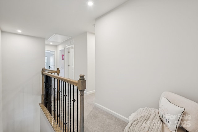 13323 Savaine St, Charlotte, NC 28278 - corridor featuring attic access, an upstairs landing, carpet flooring, and recessed lighting
