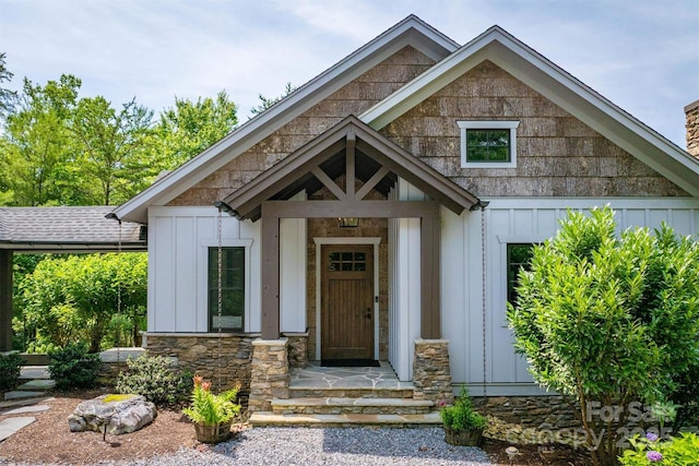 2101 October Dr Unit 150, Nebo, NC 28761 - view of exterior entry with board and batten siding and stone siding