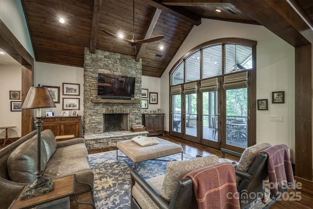 2101 October Dr Unit 150, Nebo, NC 28761 - living room with hardwood / wood-style floors, a wood ceiling with exposed beams, ceiling fan, high vaulted ceiling, and a stone fireplace
