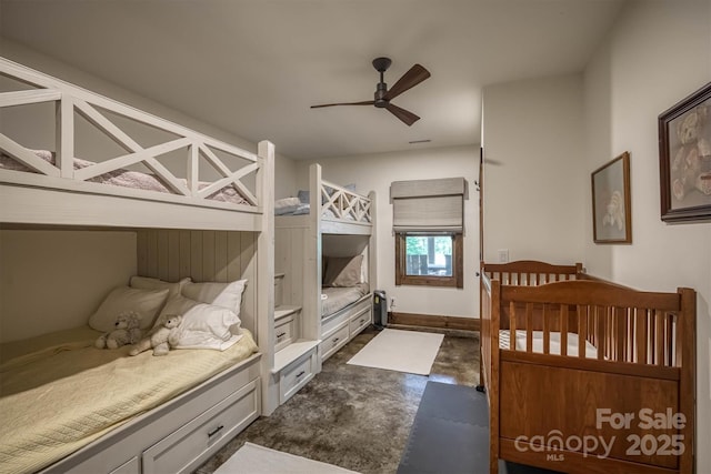 2101 October Dr Unit 150, Nebo, NC 28761 - bedroom with concrete floors and a ceiling fan