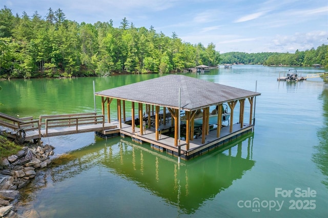 2101 October Dr Unit 150, Nebo, NC 28761 - dock area with a water view and a wooded view