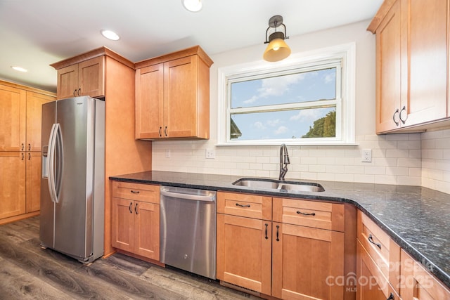 164 Dogtrot Rd, Mocksville, NC 27028 - kitchen featuring appliances with stainless steel finishes, dark wood-style flooring, tasteful backsplash, recessed lighting, and dark stone counters