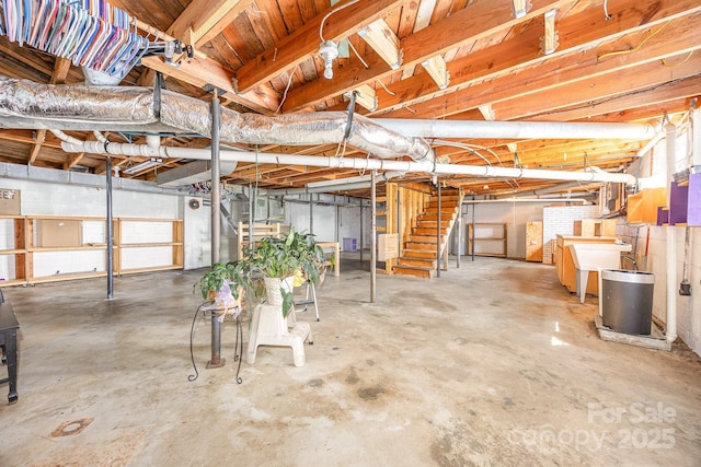 164 Dogtrot Rd, Mocksville, NC 27028 - unfinished basement featuring a sink and stairs