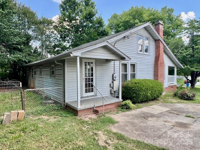67 N Highland Ave, Granite Falls, NC 28630 - view of front of home featuring a chimney