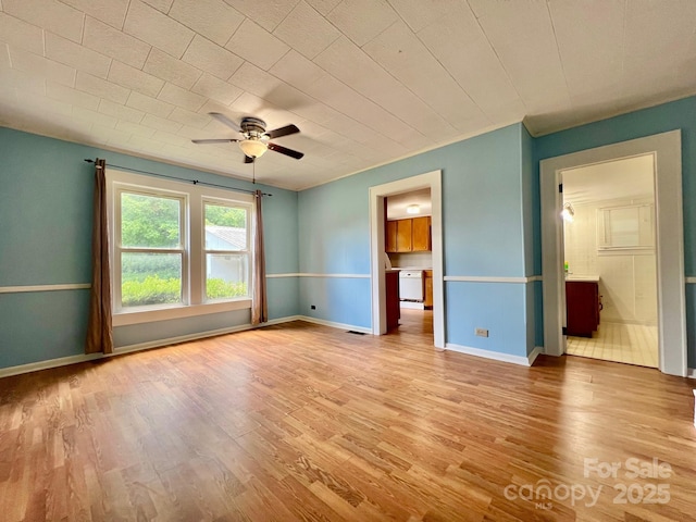 67 N Highland Ave, Granite Falls, NC 28630 - unfurnished bedroom with wood finished floors and connected bathroom