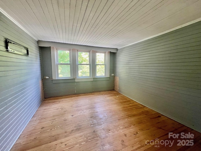 67 N Highland Ave, Granite Falls, NC 28630 - unfurnished room featuring wooden walls, wood-type flooring, and wood ceiling
