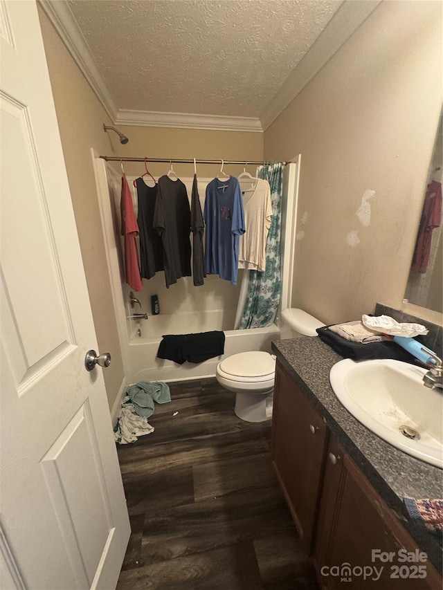423 Crocus Ln, Sylva, NC 28779 - bathroom featuring shower / bathtub combination with curtain, vanity, wood finished floors, a textured ceiling, and crown molding