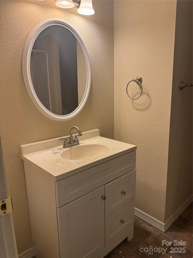 423 Crocus Ln, Sylva, NC 28779 - bathroom featuring vanity and a textured wall