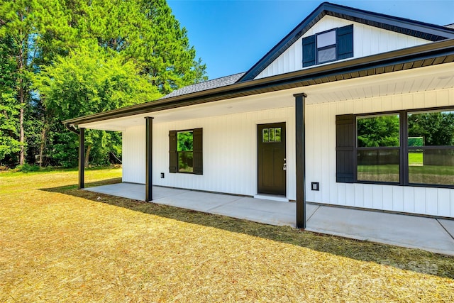 3248 Ferguson Long Rd, York, SC 29745 - back of property featuring covered porch and a lawn