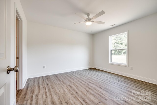 3248 Ferguson Long Rd, York, SC 29745 - empty room with wood finished floors and ceiling fan