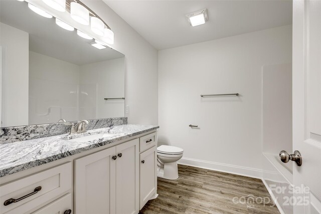 3248 Ferguson Long Rd, York, SC 29745 - full bathroom featuring a shower, vanity, and wood finished floors