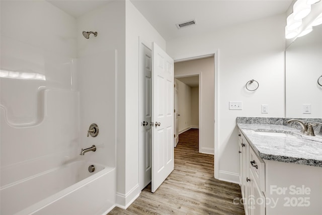 3248 Ferguson Long Rd, York, SC 29745 - full bathroom with wood finished floors, vanity, and  shower combination
