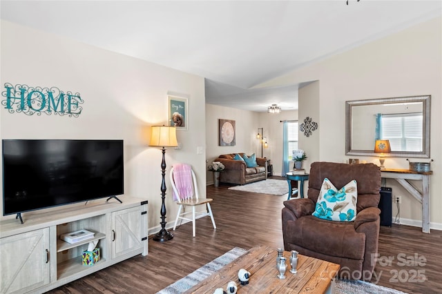 5967 Odenton Ln, Pfafftown, NC 27040 - living area featuring dark wood-type flooring and lofted ceiling