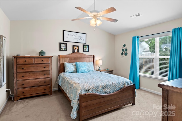 5967 Odenton Ln, Pfafftown, NC 27040 - carpeted bedroom with lofted ceiling and a ceiling fan
