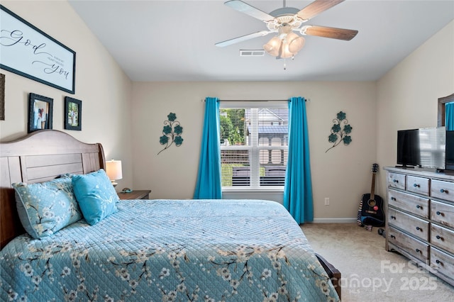 5967 Odenton Ln, Pfafftown, NC 27040 - carpeted bedroom with a ceiling fan and baseboards