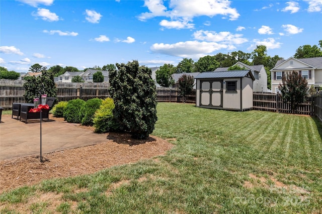 5967 Odenton Ln, Pfafftown, NC 27040 - fenced backyard with a shed and a patio area