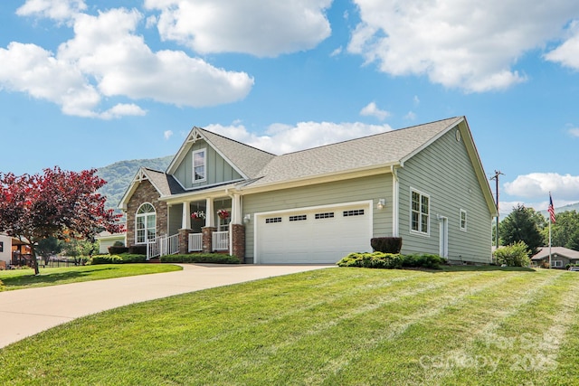 8 Amos Ct, Maggie Valley, NC 28751 - view of front of house with concrete driveway, a garage, a front lawn, a porch, and board and batten siding