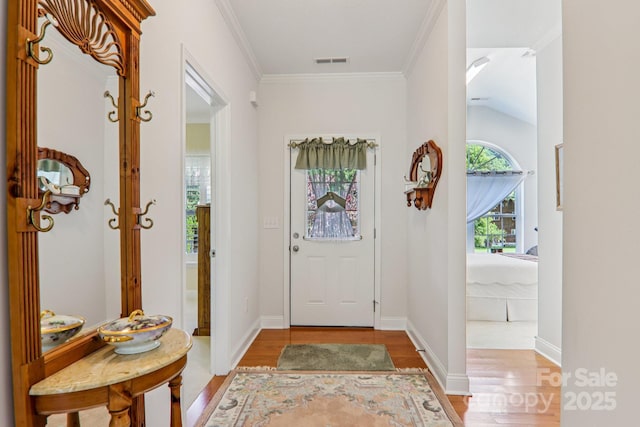 8 Amos Ct, Maggie Valley, NC 28751 - entrance foyer with light wood-style floors and crown molding