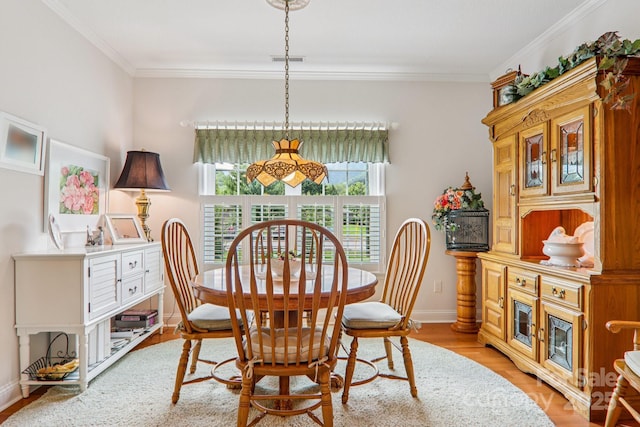 8 Amos Ct, Maggie Valley, NC 28751 - dining room featuring light wood-style floors and ornamental molding
