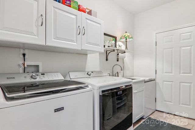 8 Amos Ct, Maggie Valley, NC 28751 - laundry room featuring washer and dryer and cabinet space